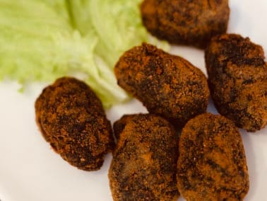 Croquetas de luras en tinta